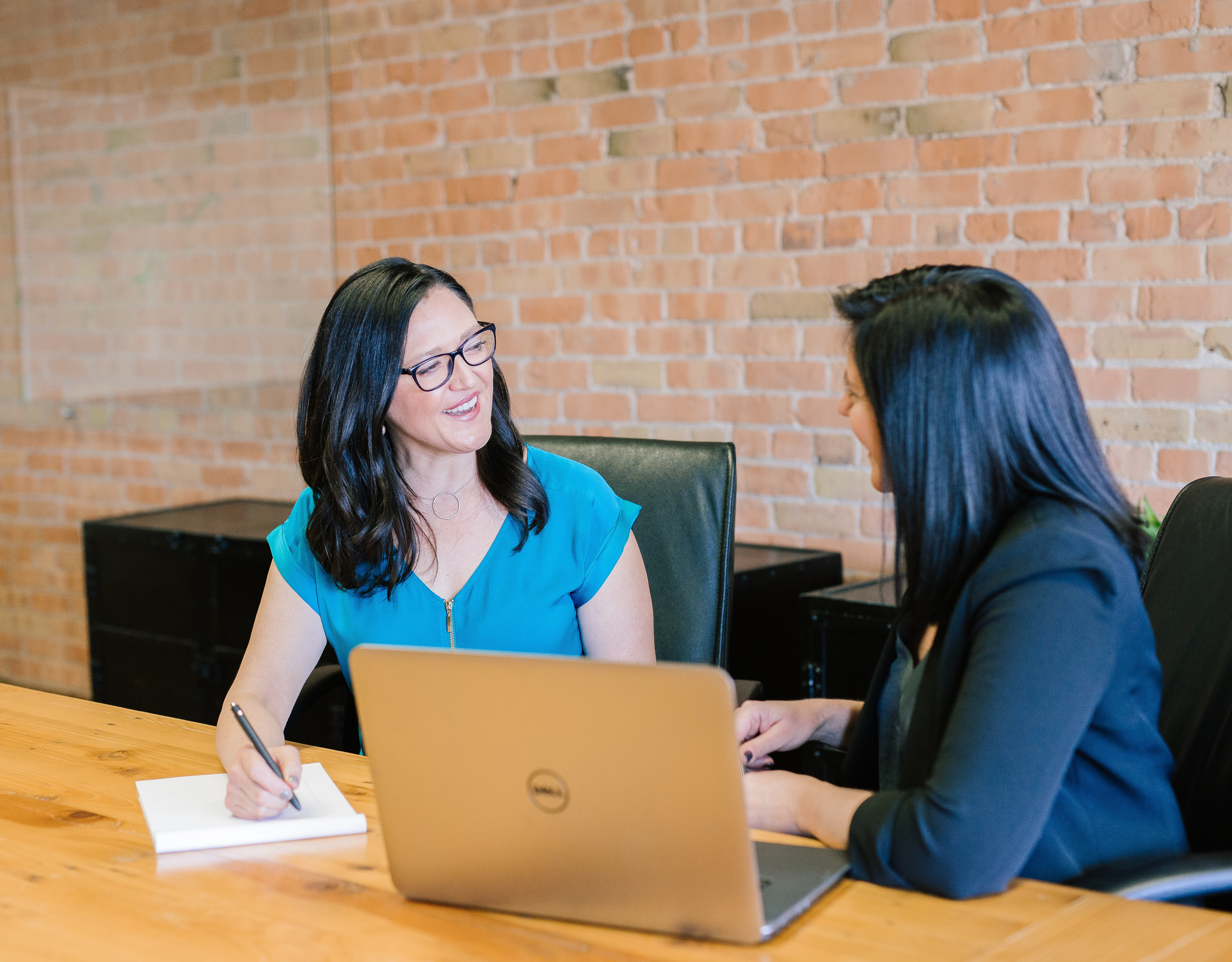 Two women talking in an office