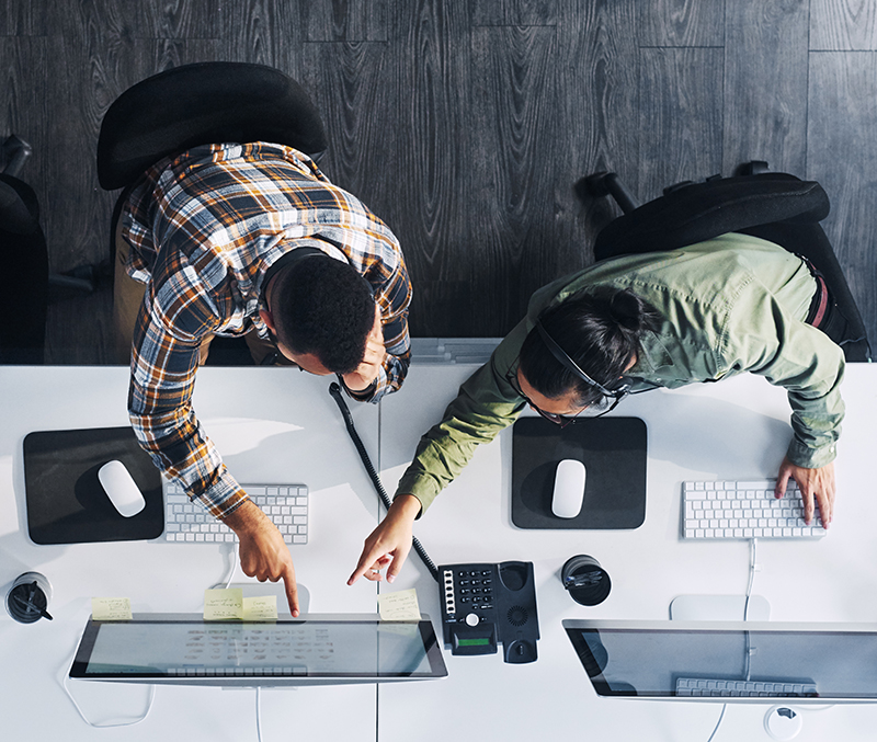 High angle shot of a group of call centre agents working in an office