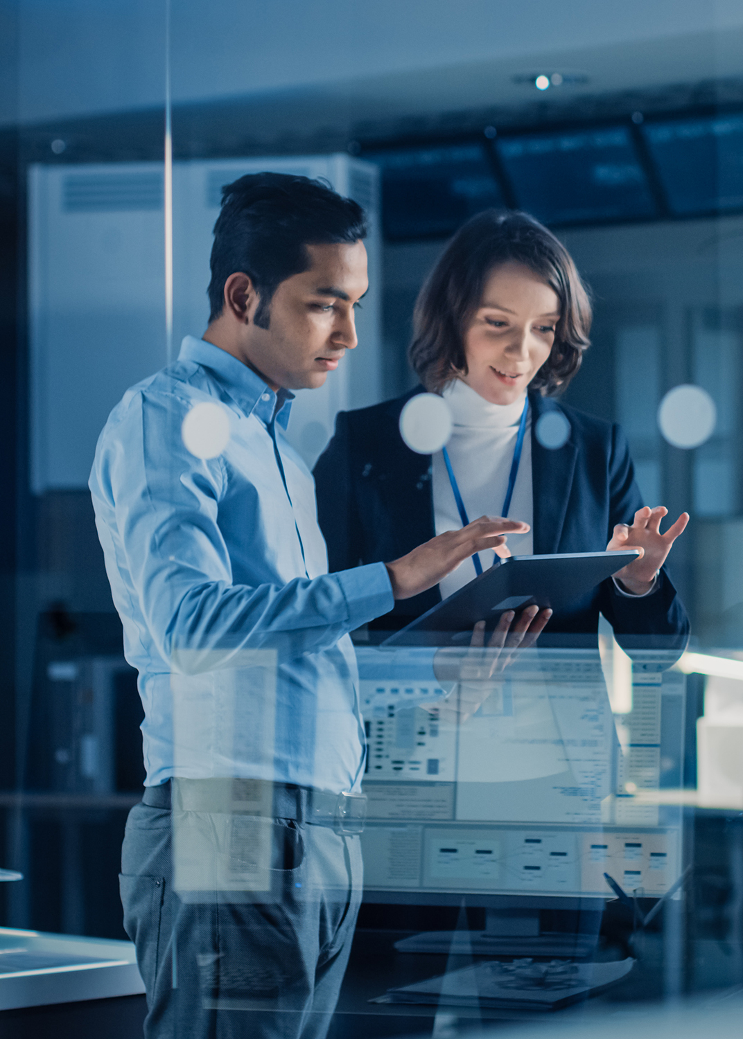 Female Project Manager Talks With Engineer